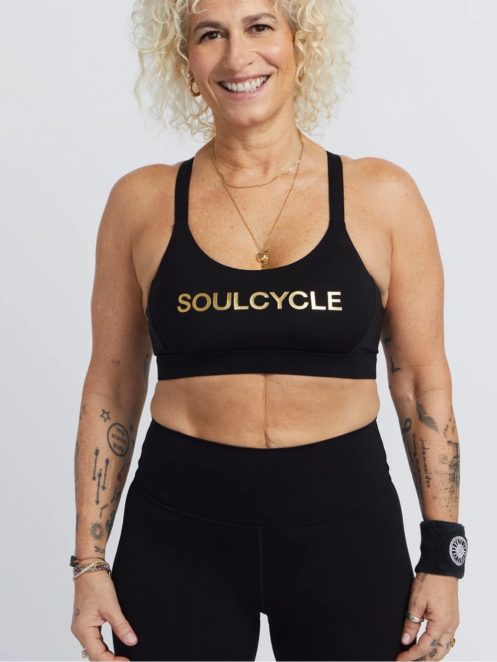 SoulCycle black and gold podium bra